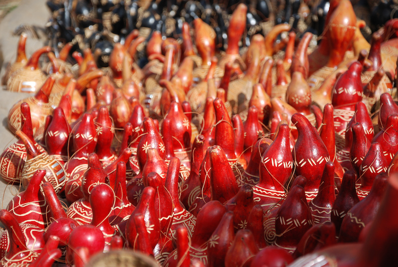 carved red gourds at a market in Nairobi